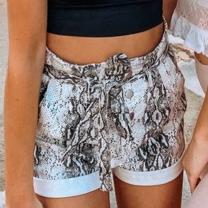 Snake print denim shorts